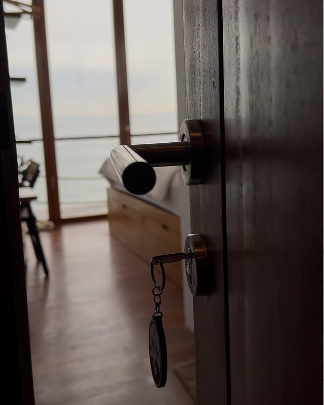 A room door opens onto an ocean view at The Ohm, Thomas Beach